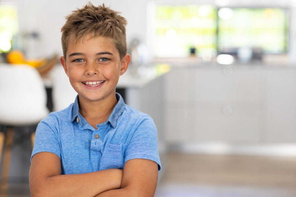A young boy smiling